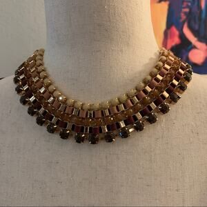 5 row crystal and ribbon. Nice double wide chain side browns and taupe 16”